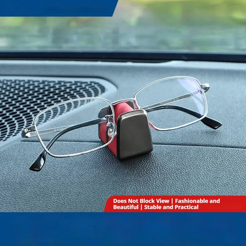 Zinc alloy car dashboard glasses holder in four colours measuring 3.7x3.2x2.5 cm