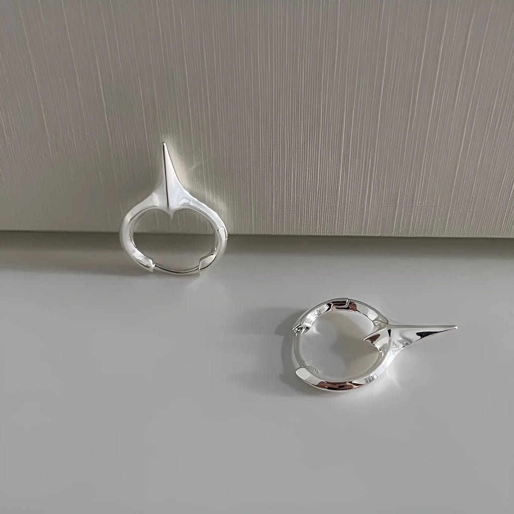 Copper star-shaped ear clip for women with a platinum electroplated finish.