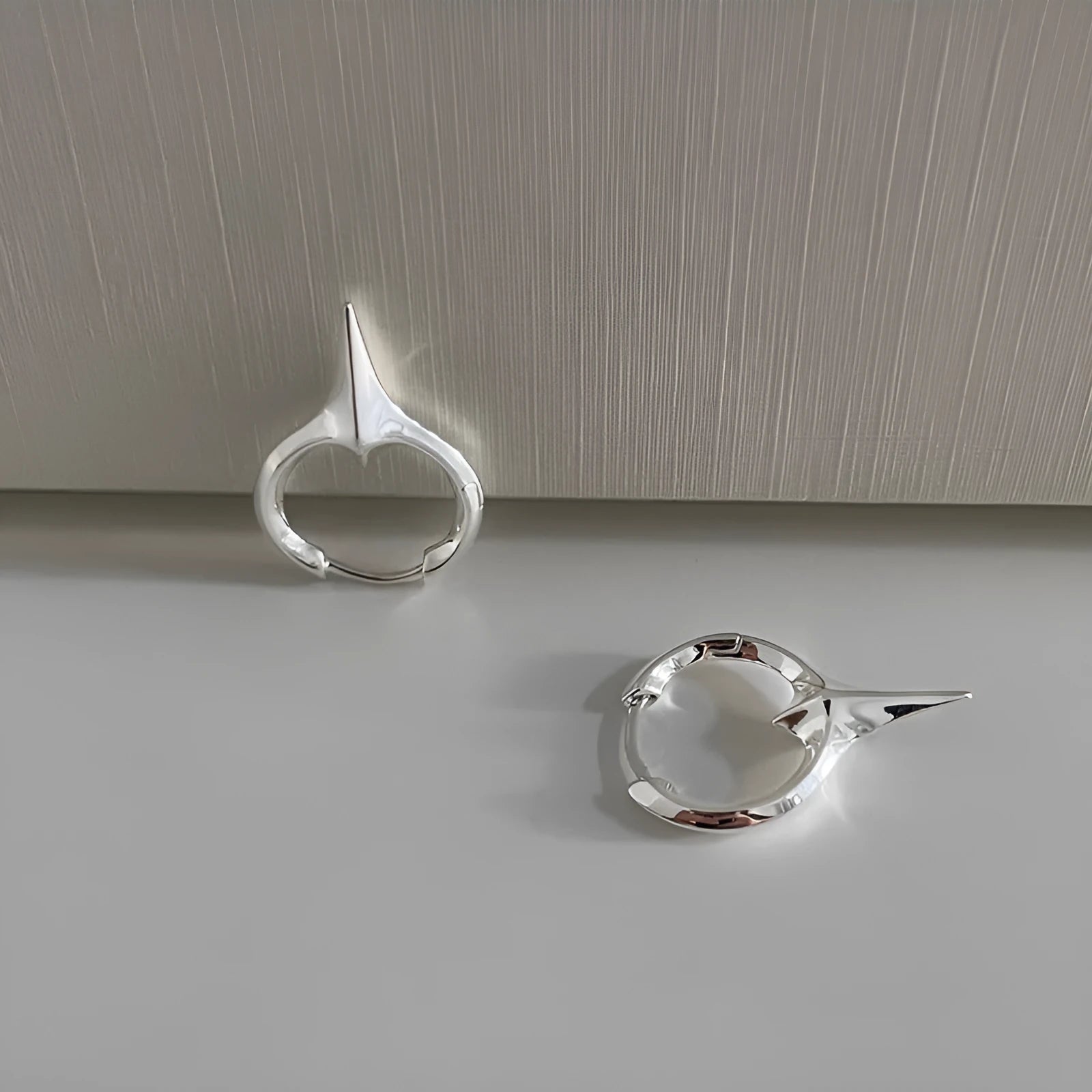 Copper star-shaped ear clip for women with a platinum electroplated finish.