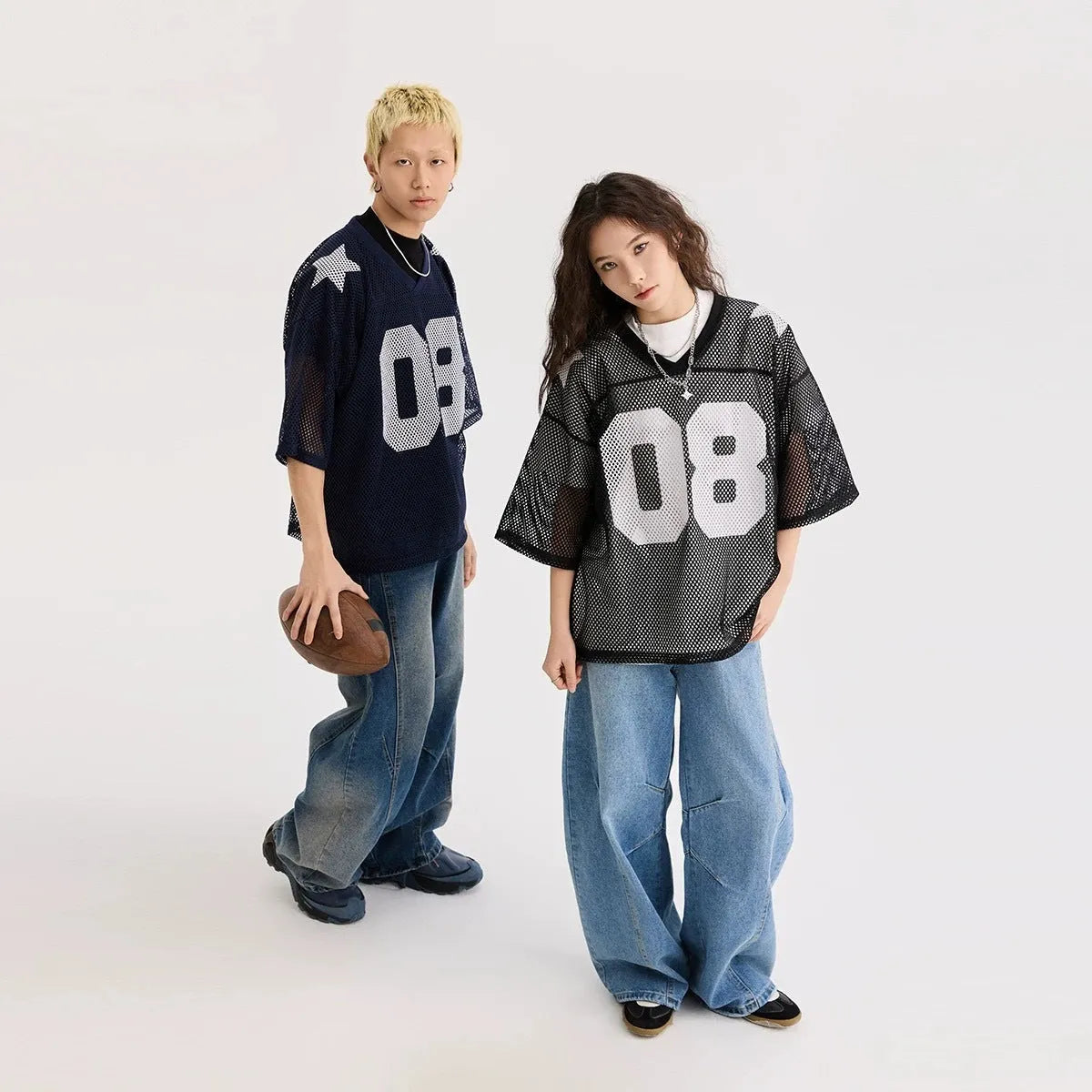 Black loose fit pullover shirt with white letter print and half sleeves