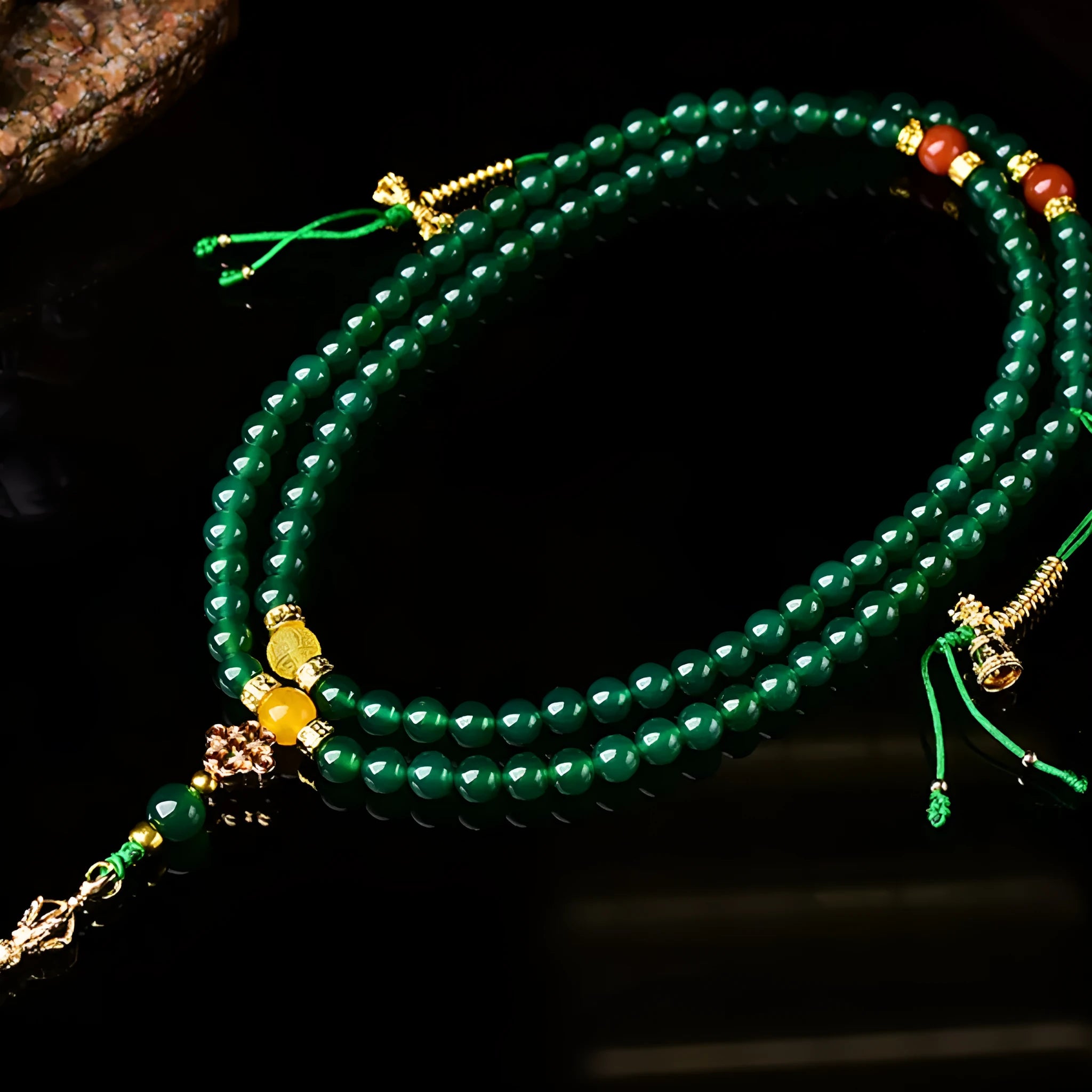 Natural green agate multi-circle bracelet on display showing 8mm bead size unisex design