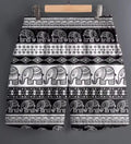 Men's patterned polyester sports shorts on a hanger, showing camouflage and stripe design options.