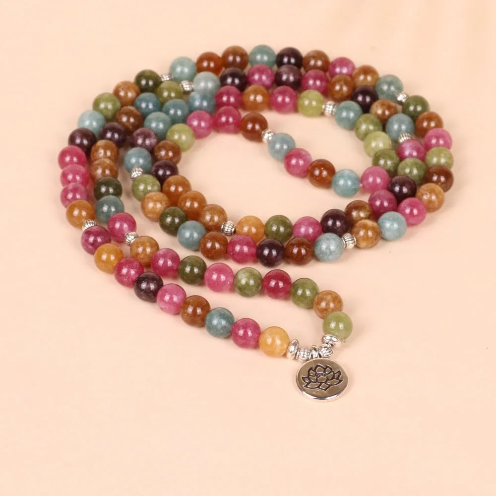 Multi-strand bracelet with 108 natural tourmaline beads and lotus charm on alloy chain