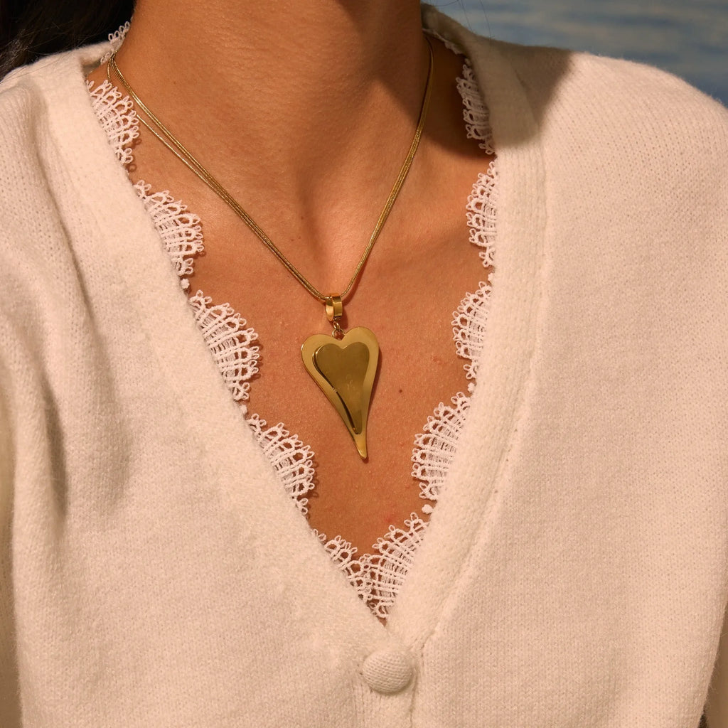 Women's geometric snake bones chain necklace with double heart design in gold or steel finish