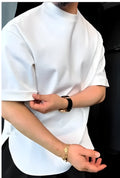 Men's white cotton t-shirt with a button-up front detail and a round hem.
