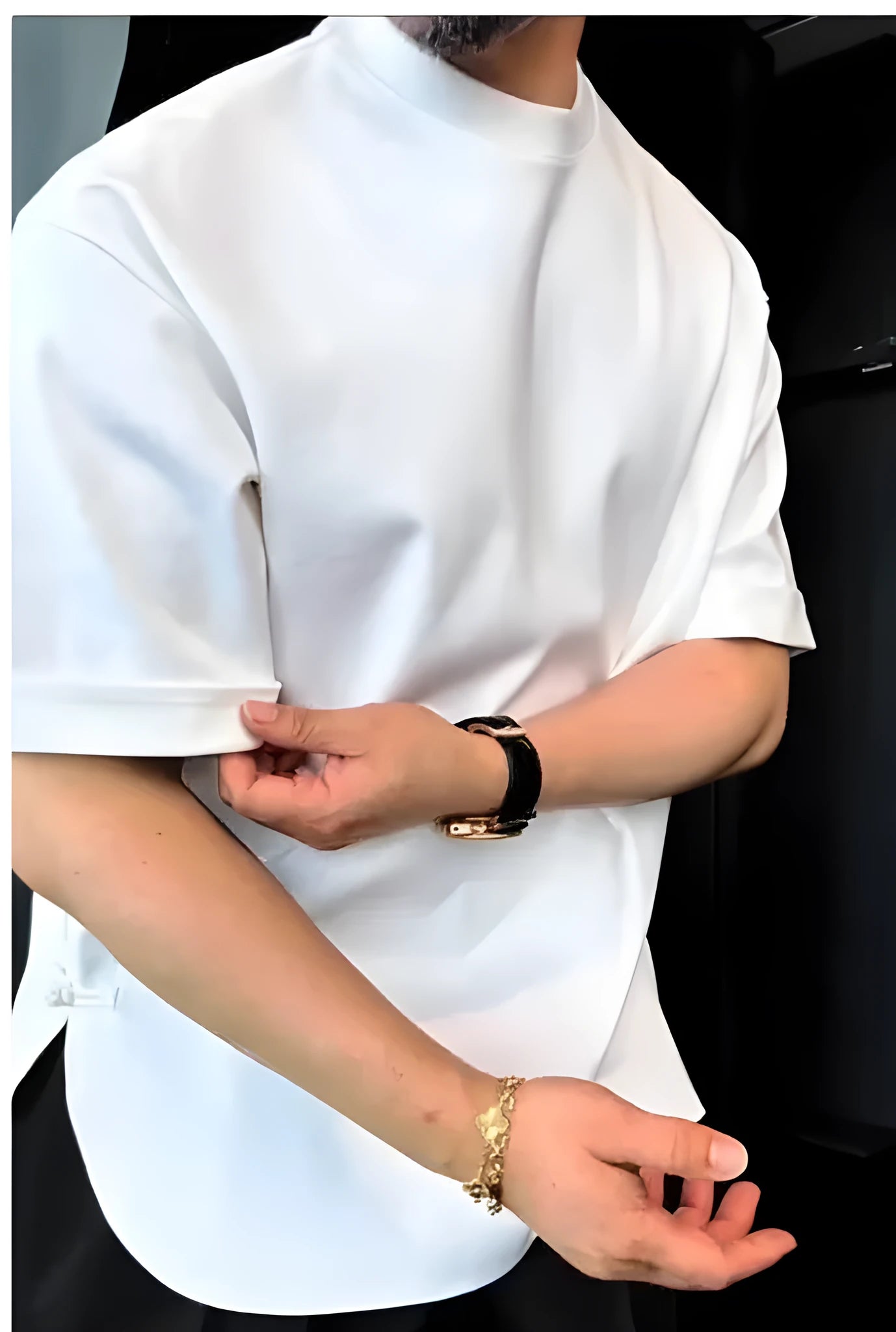 Men's white cotton t-shirt with a button-up front detail and a round hem.
