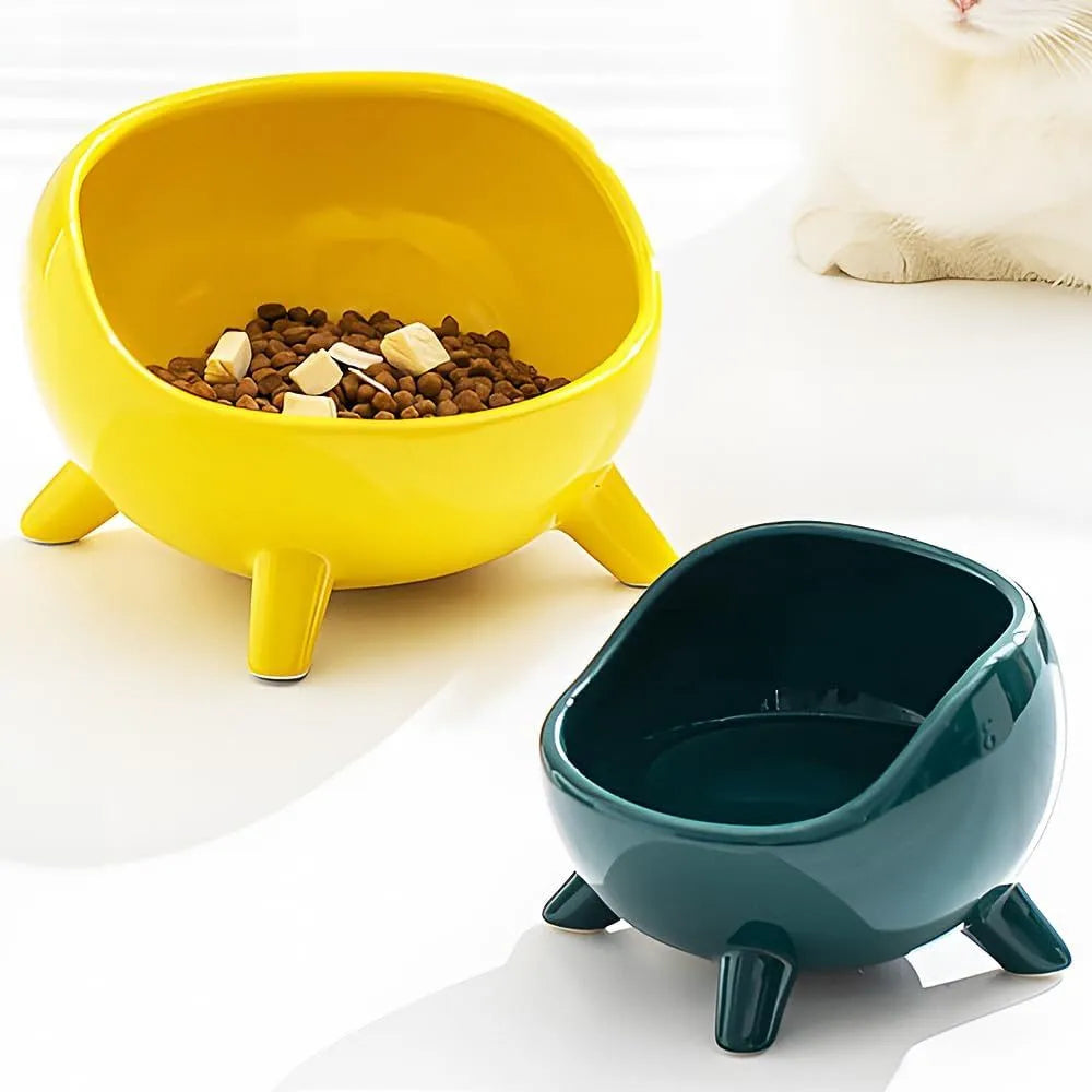 Ceramic cat food bowl with four legs, rounded arc shape, in green or yellow, small and large sizes