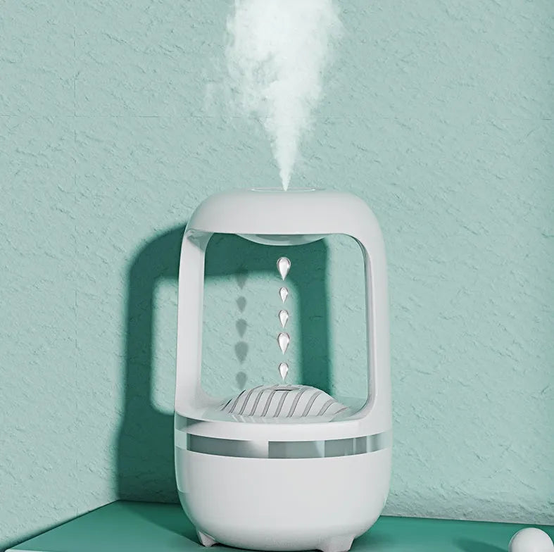 Anti gravity water drop backflow humidifier with 500ml tank in white on a desk