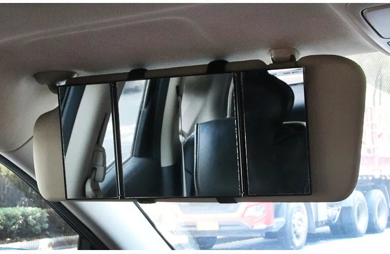 Silver car folding makeup mirror showing compact and opened positions