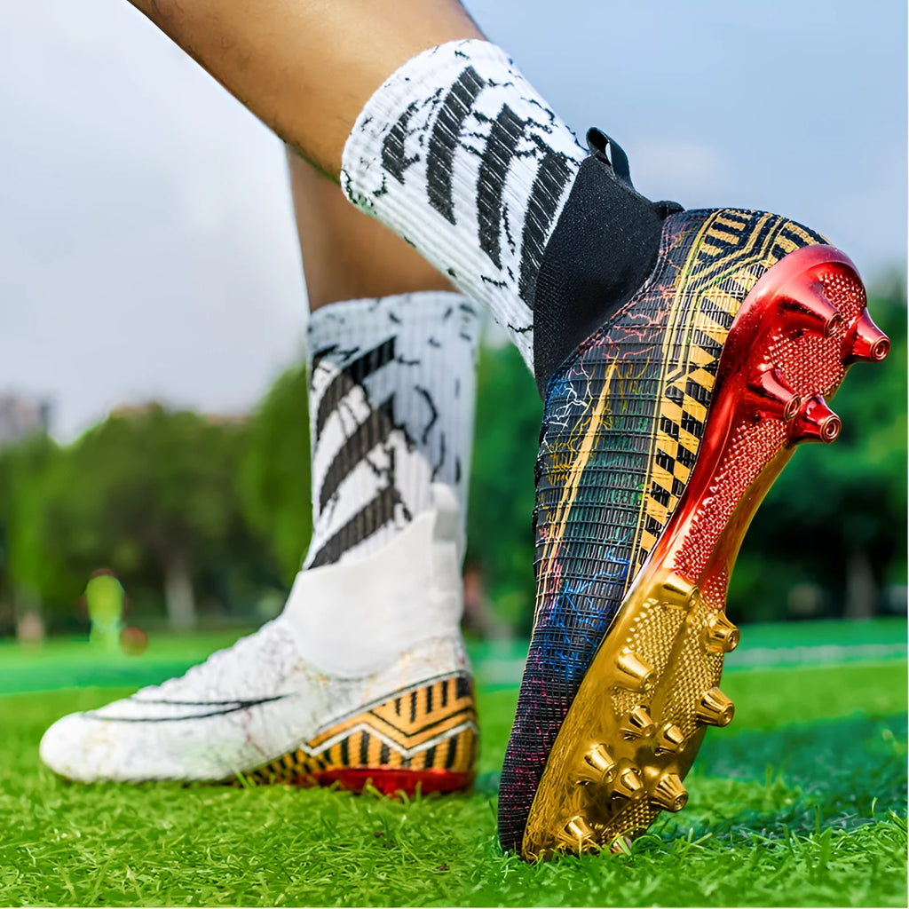 High-top soccer shoes with gold plated bottom, synthetic leather upper, in black colour, side view