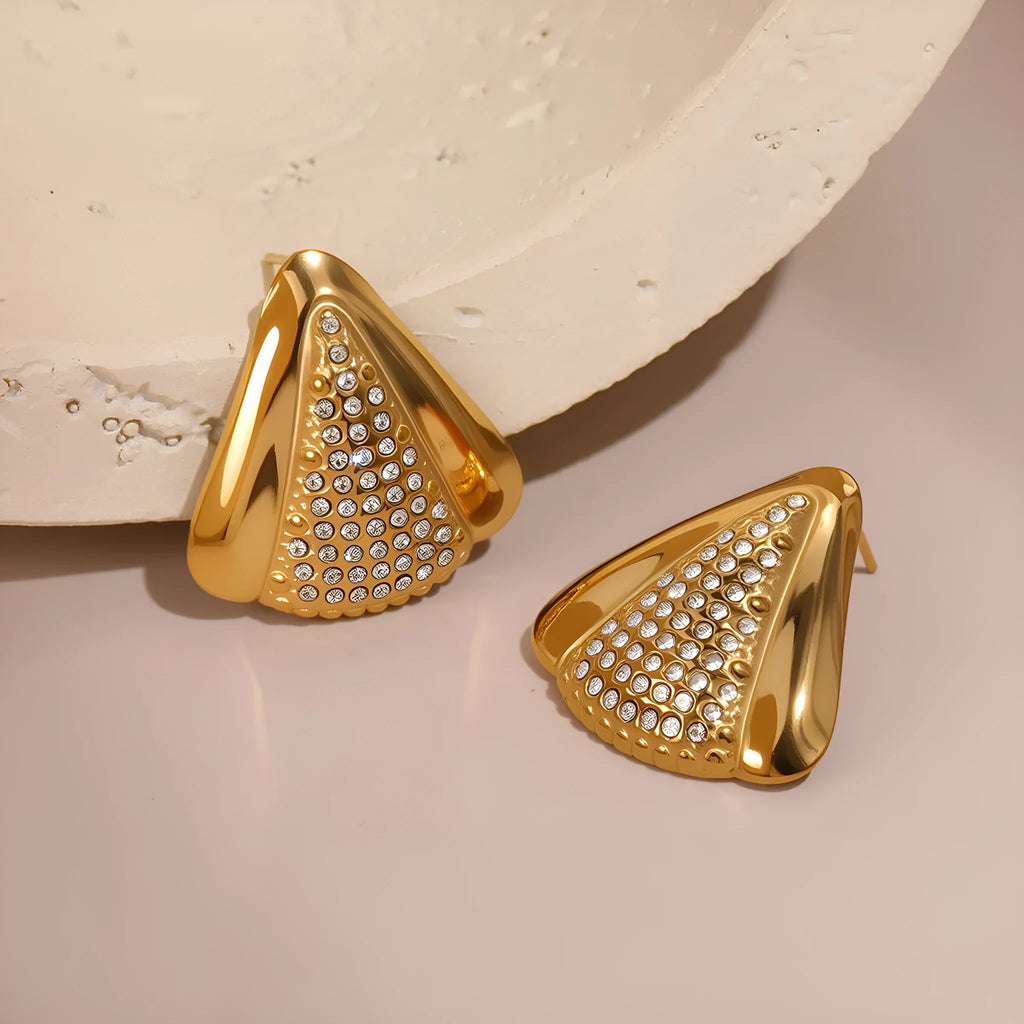 Gold triangle stainless steel geometric stud earrings with electroplated finish on white background