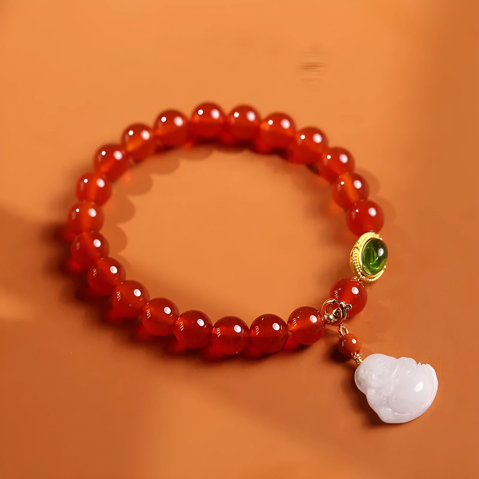 Natural agate bracelet with red agate beads and hanging jade Maitreya Buddha pendant in ancient gold tone