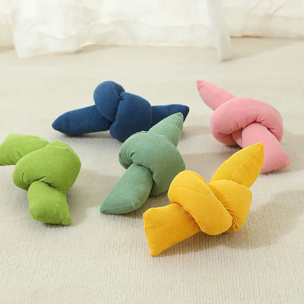 White natural cotton dog rope toy with multiple sturdy knots for tugging and chewing