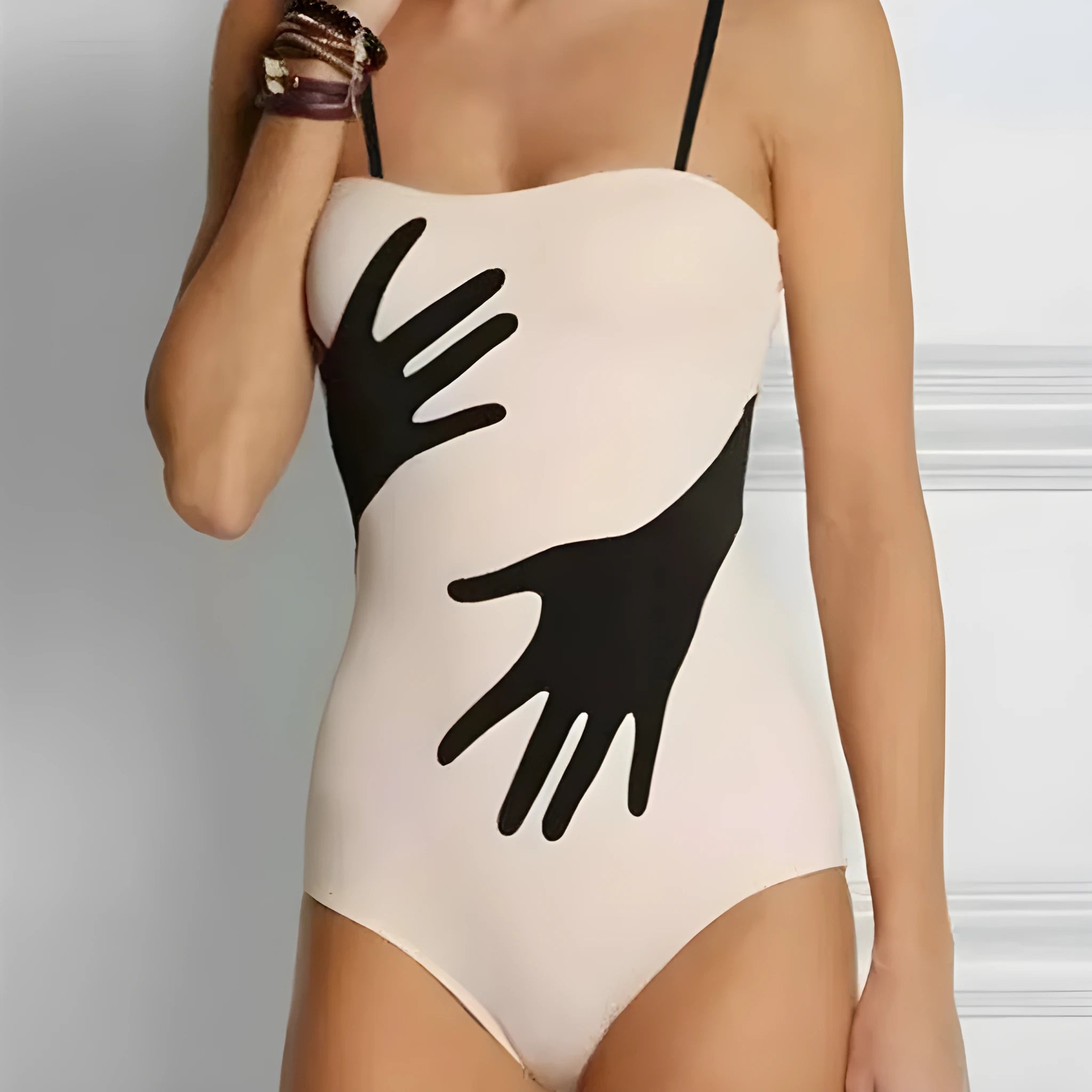 Women's polyester one-piece bikini swimsuit with a gauze skirt, shown in sizes S M L XL.