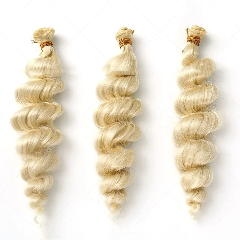 Golden blonde synthetic hair weft wig shown in 18, 20, and 22 inch lengths.