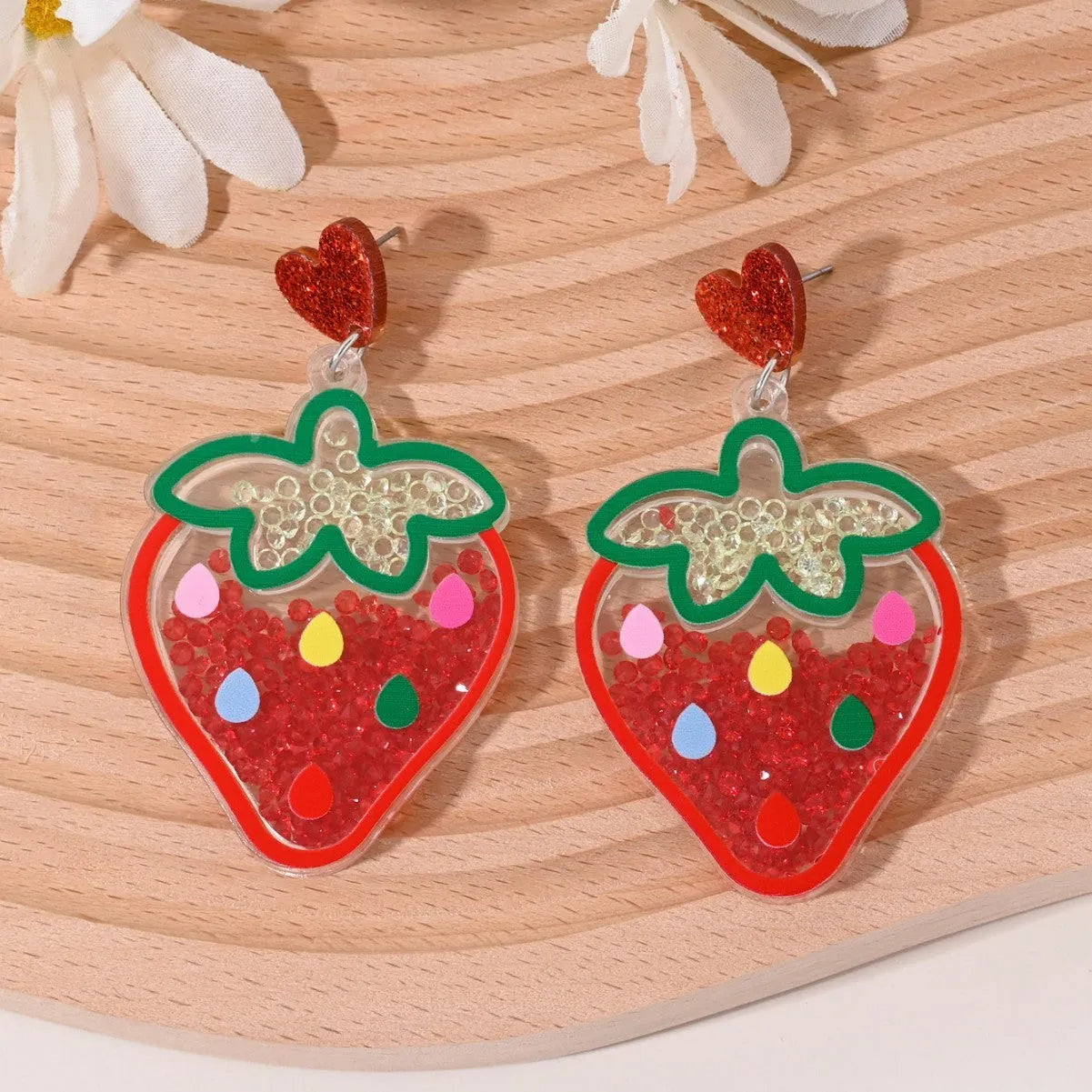 Colourful acrylic fruit earrings for women featuring cherry, strawberry, watermelon, and pineapple shapes, dangle style