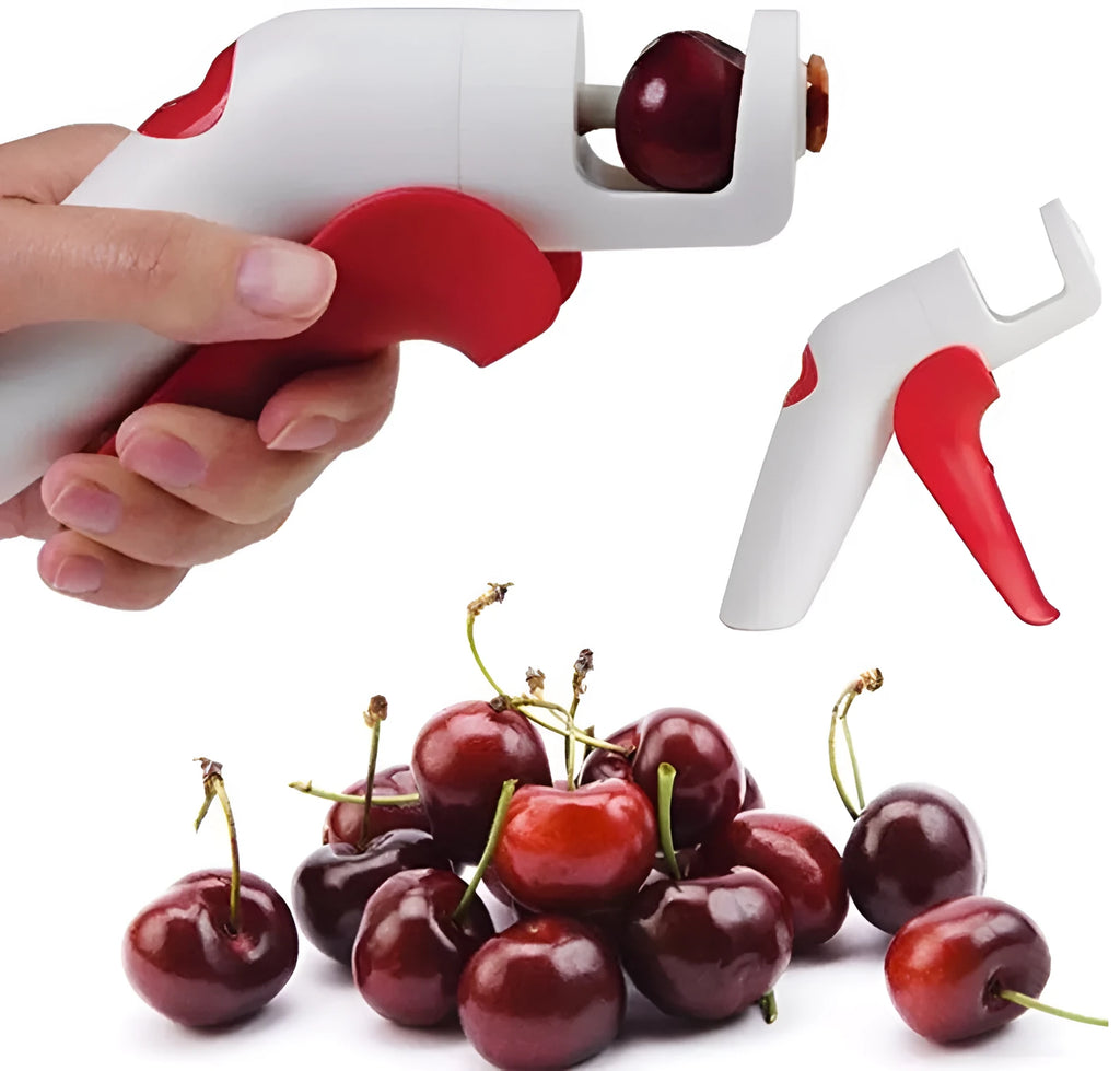 Cherry kernel remover, a handheld plastic kitchen gadget for pitting cherries, on a light background