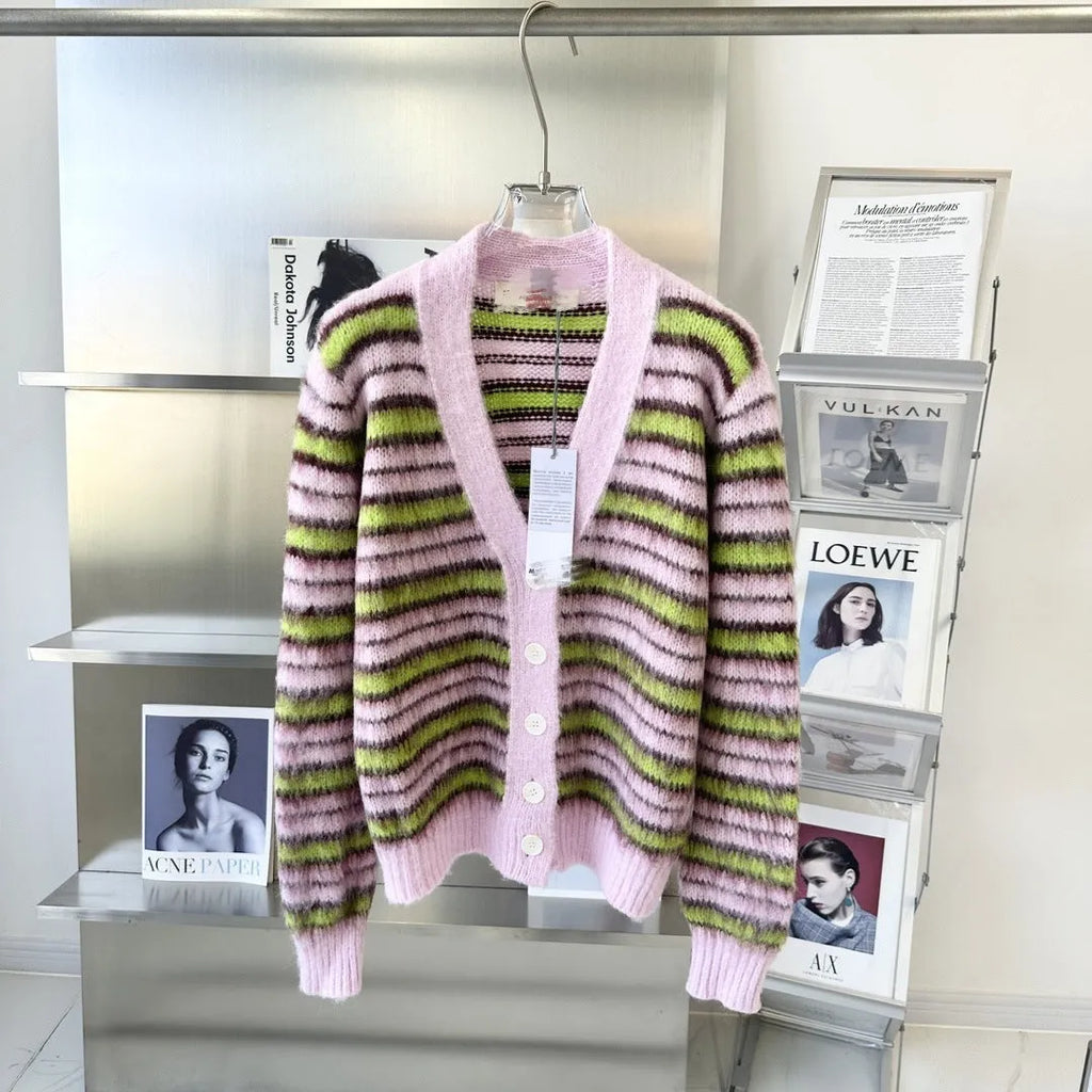 Pink wool knitted cardigan sweater with nap craft texture and regular sleeves