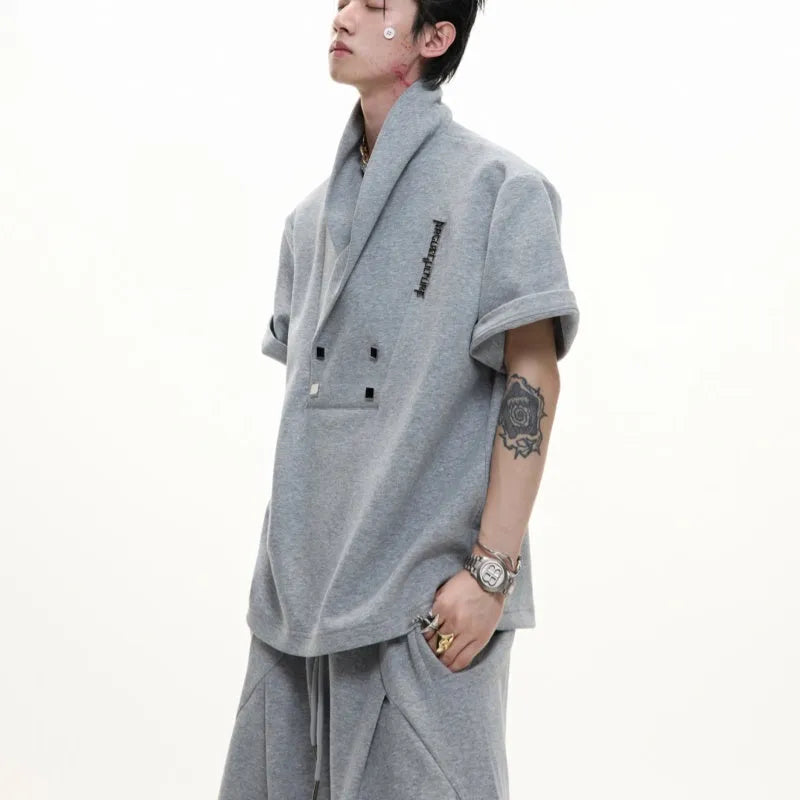 Men's dark grey V-neck sports suit with metal embellished jacket and matching athletic shorts