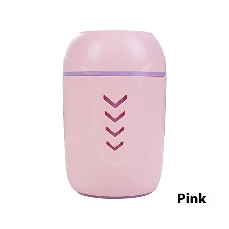 Round desktop air purifier with aromatherapy in blue, showing single fog outlet and USB cable