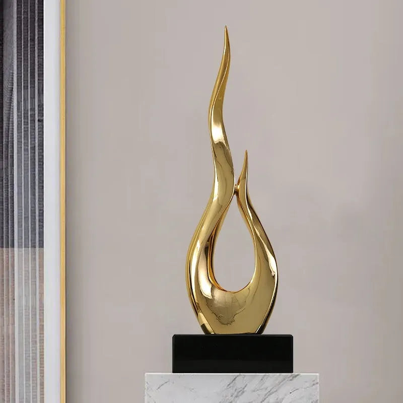 Resin high-rise festival decoration craft in bright gold colour with modern simple design