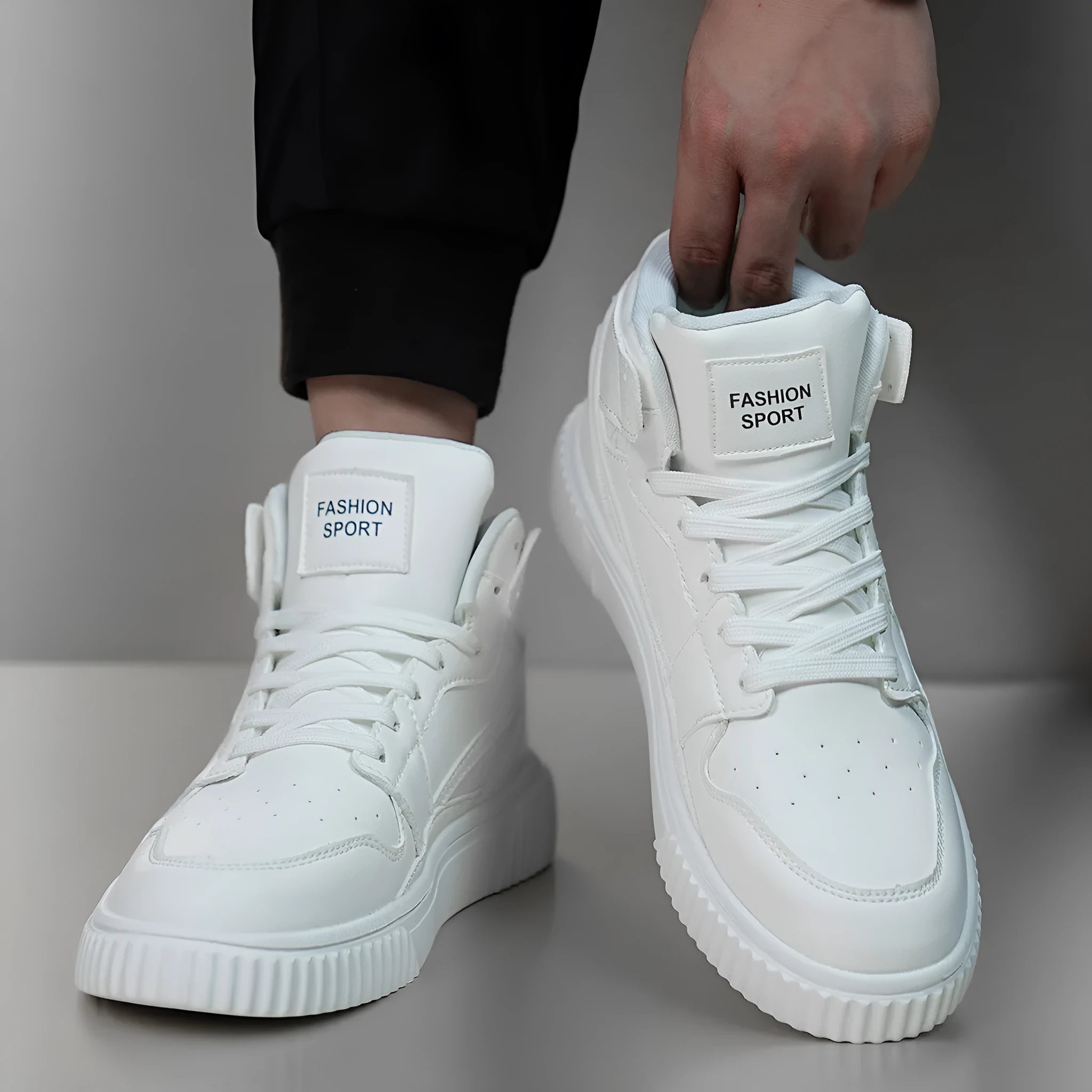 Men's white lace-up casual trainers with a microfiber upper and round toe on a plain background.