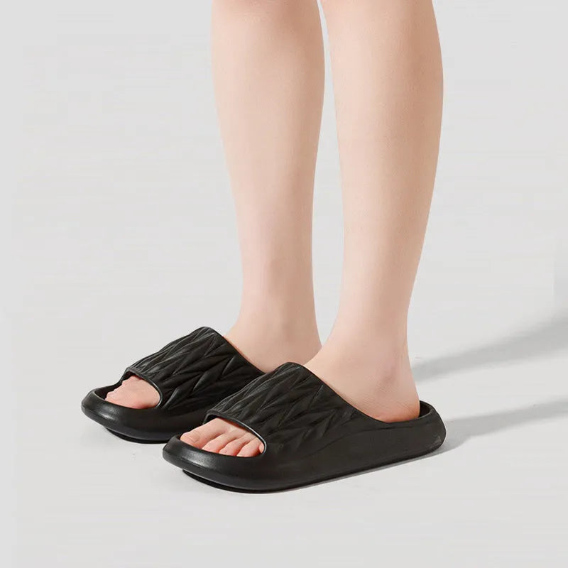 Leaf texture design EVA household slippers for men and women in various colours on a non-slip sole.