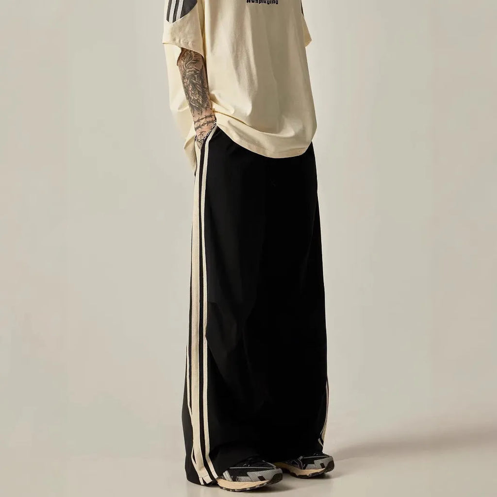 Men's black wide leg climbing pants with high waist and straight-leg design