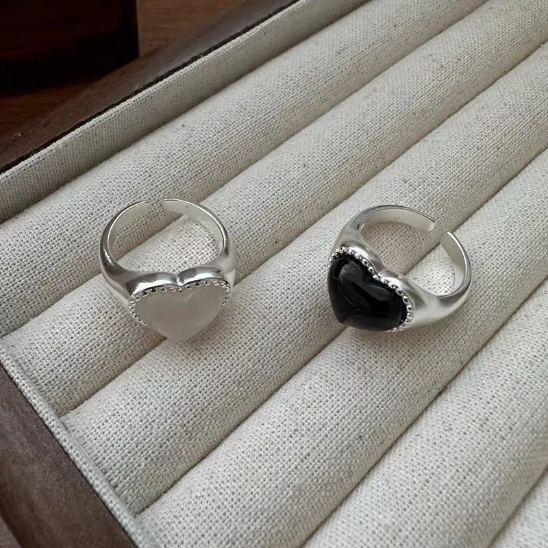 S925 sterling silver adjustable ring with a heart-shaped black agate stone.