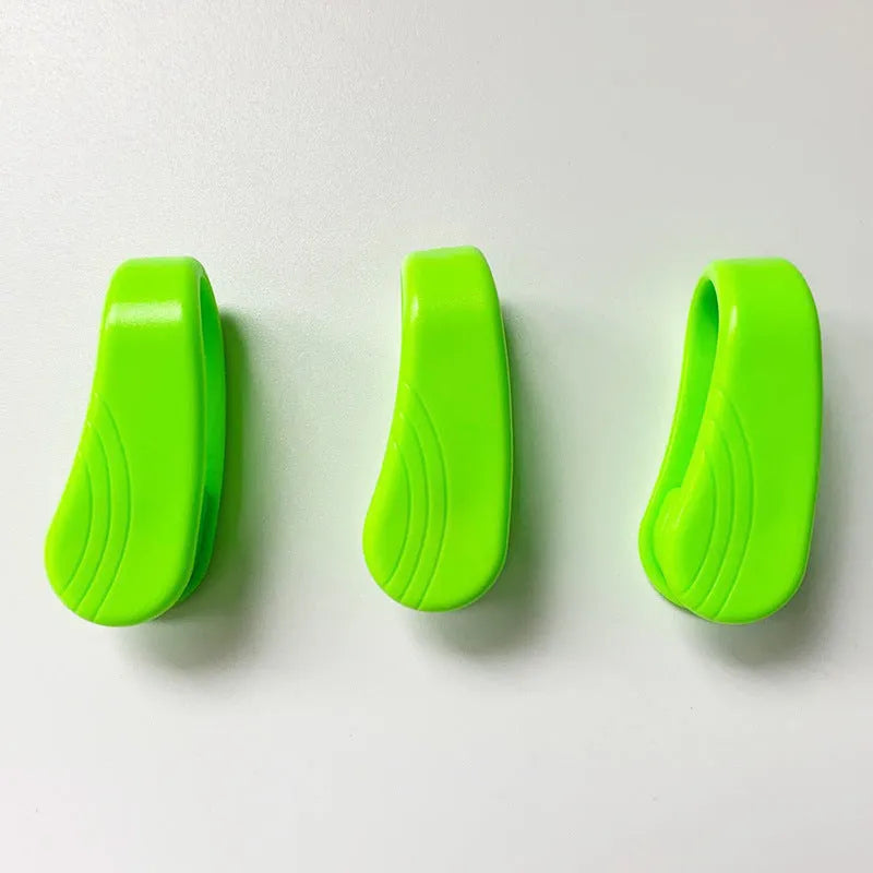 Tiger mouth massage clip acupoint massager in black, blue, green, and pink PP material