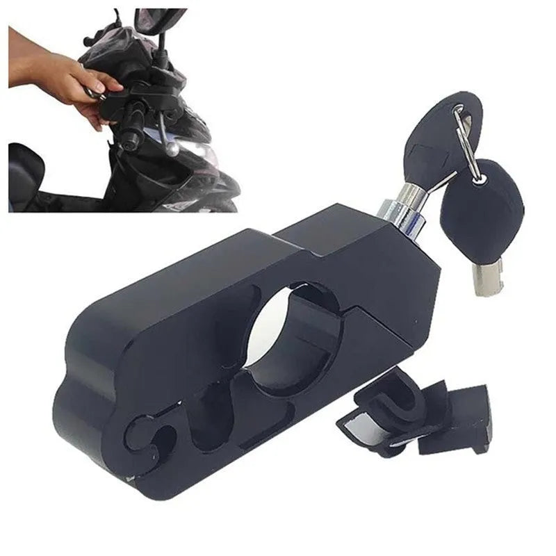 Black CNC aluminium motorcycle handlebar lock with key inserted, on a motorcycle brake lever