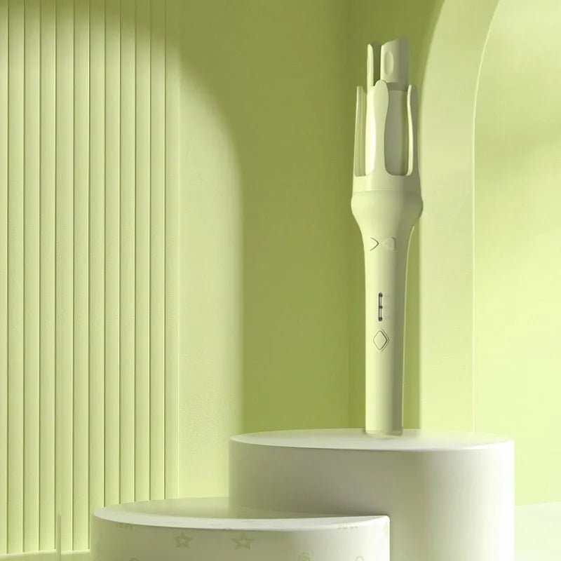 Automatic hair curler in a choice of colours with a 32mm barrel and international plug adapter.