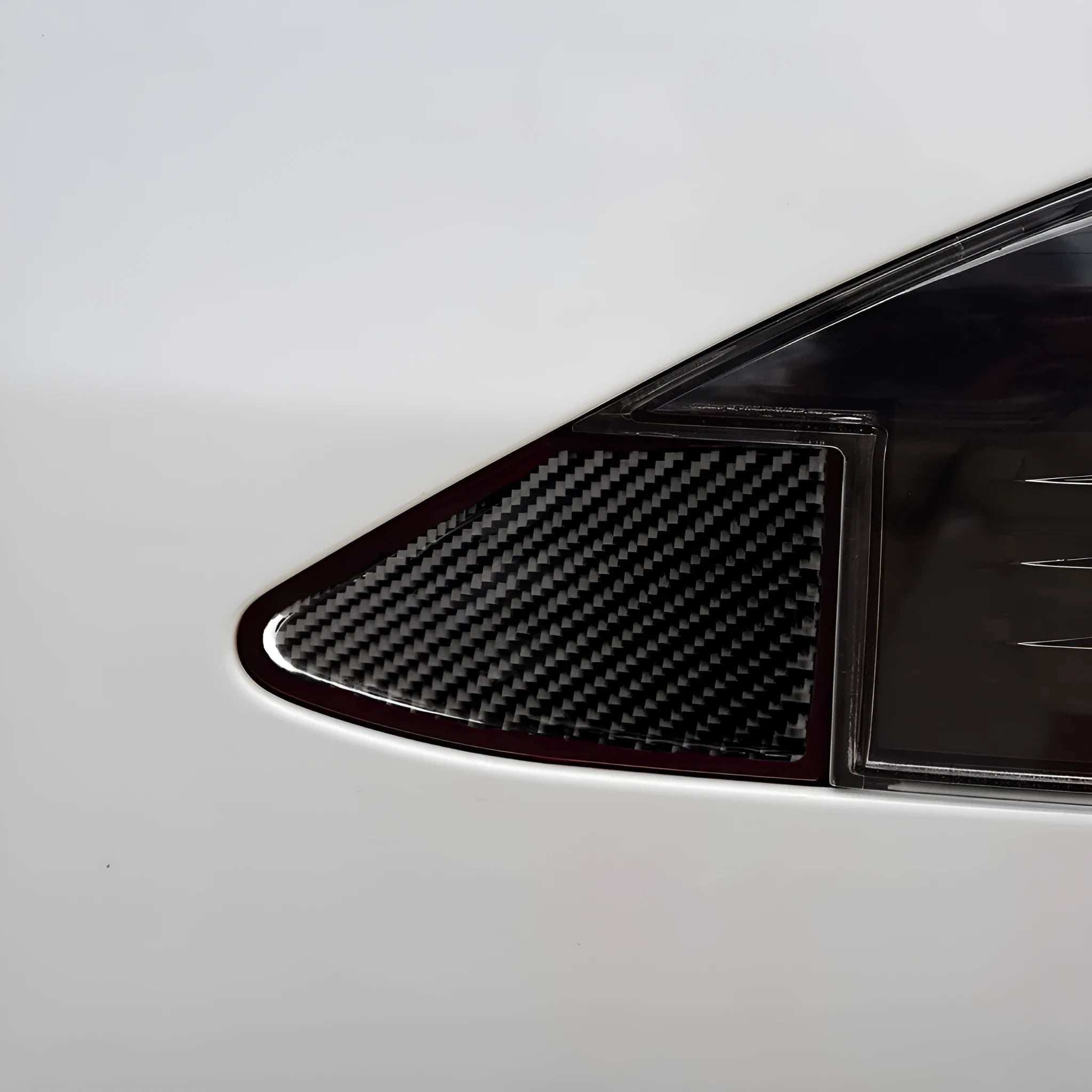 Carbon fibre USB charging port panel sticker with adhesive backing for vehicle interior
