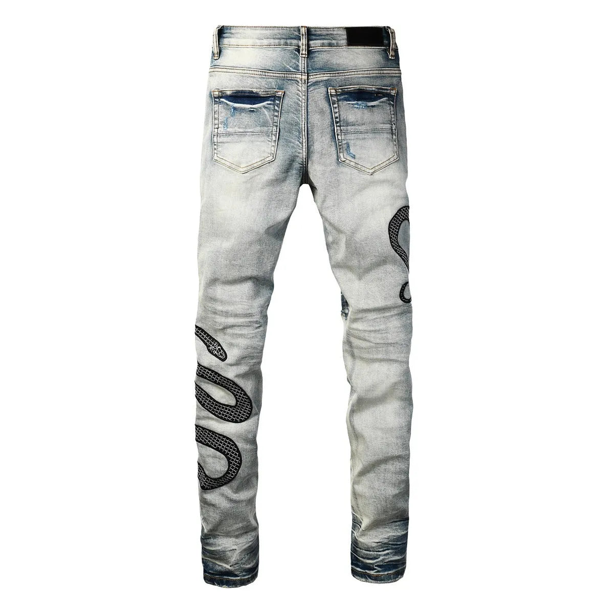 Women's blue distressed skinny jeans with mid-waist fit and button fly detail