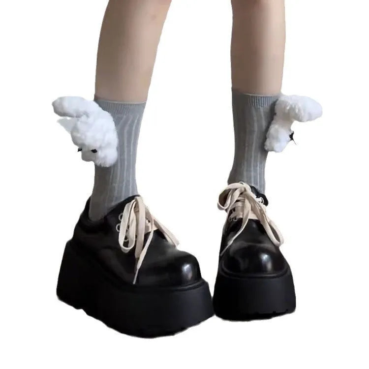 Women's matte black chunky heel lace-up shoes with a round toe and thick rubber sole.