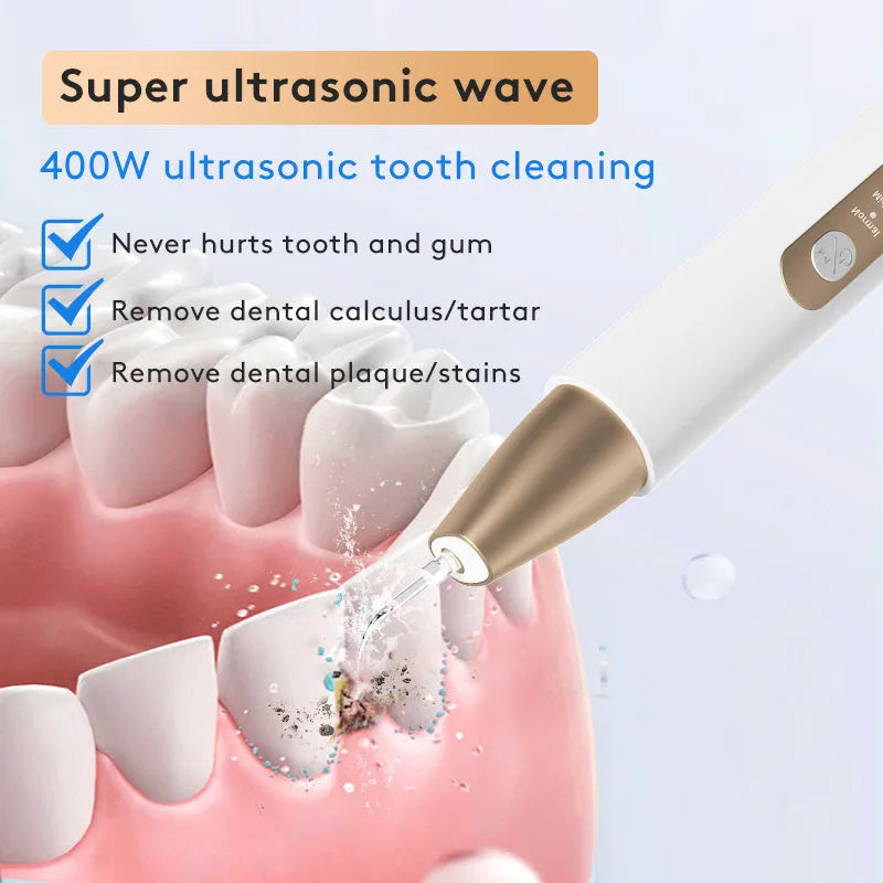 Gold-coloured ultrasonic tooth cleaning device for removing tartar and stains