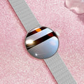Women's smart watch with circular colour screen and metal strap on wrist