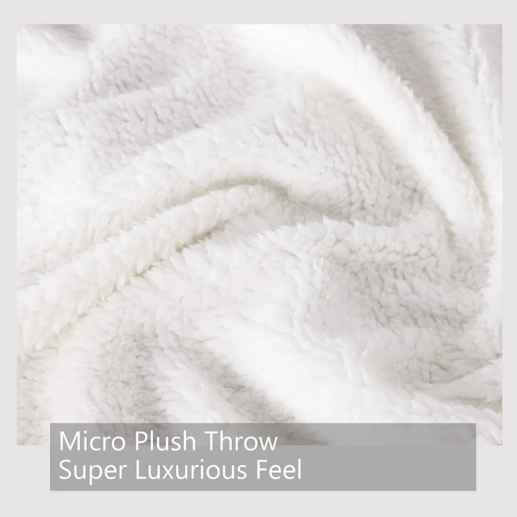 High weight soft warm horse themed lamb wool blanket in black, 130x150cm size, folded on sofa