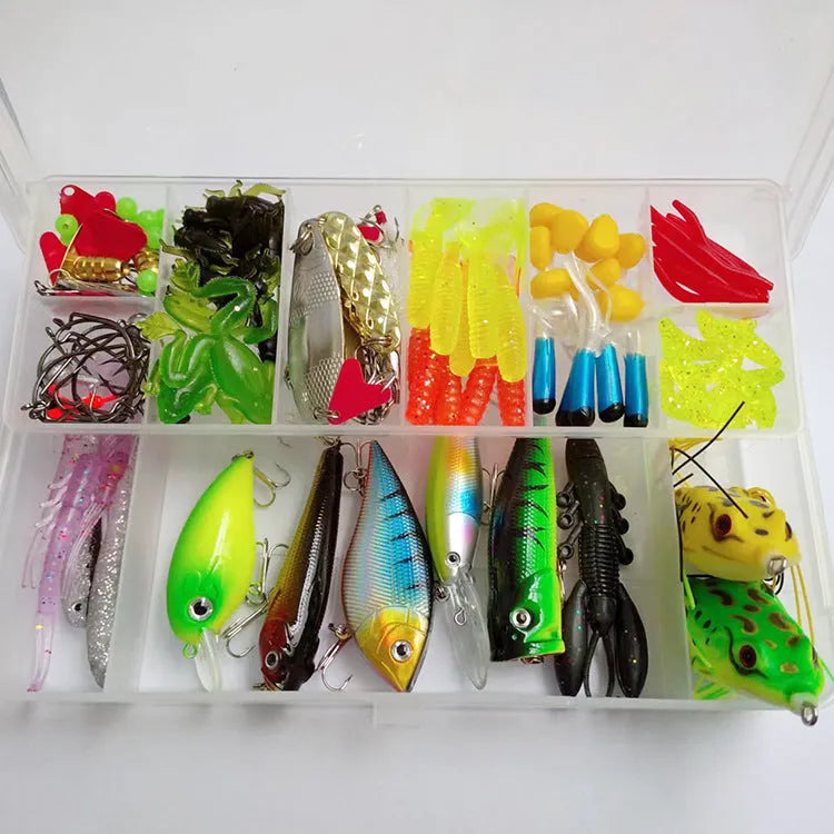 142-piece fishing lure suit set with metal fishing pliers, hard mino lures, and sequin baits on a tackle box.