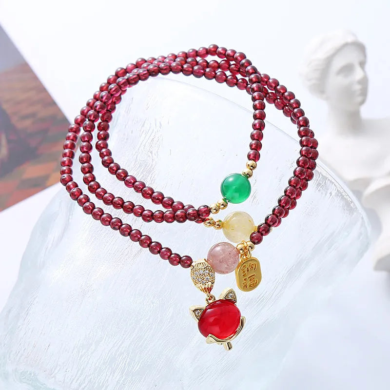 Natural garnet crystal fox bracelet for women in purplish red with adjustable rope