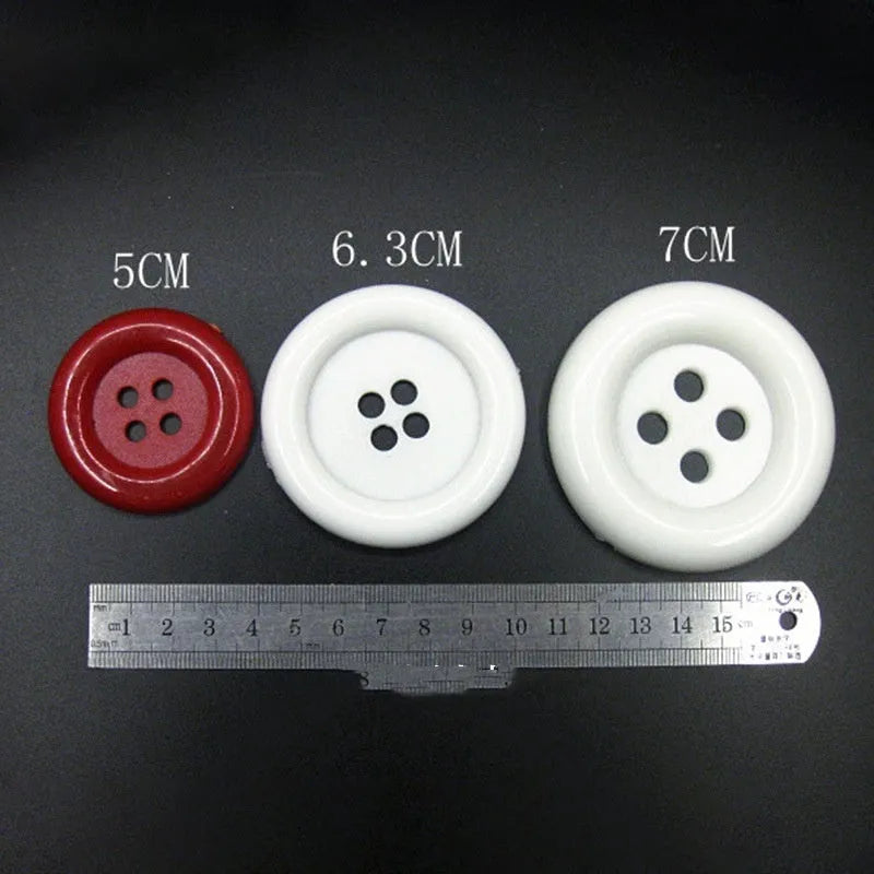 Oversized round plastic nylon button with four holes in 38mm size white colour