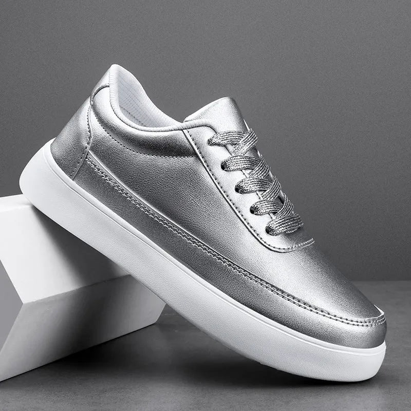 Women's white leather lace-up casual flat shoes on a solid background