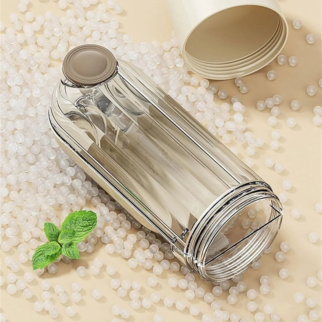 Beige and green foldable dog water bottle with integrated food container at the base