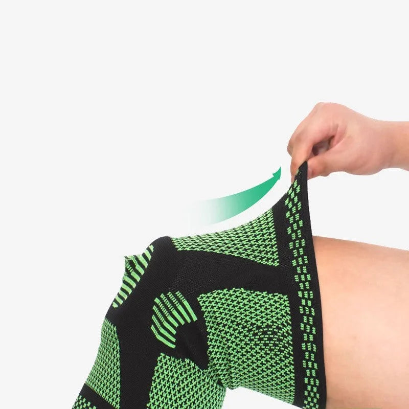 Close-up of a polyamide sports knee pad with a visible silicone spring, shown in blue.