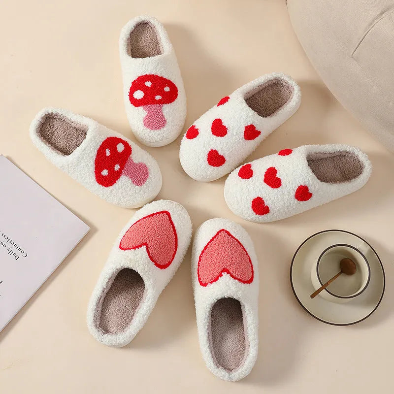 Women's plush cartoon love style home slippers with a round toe and non-slip PVC sole.