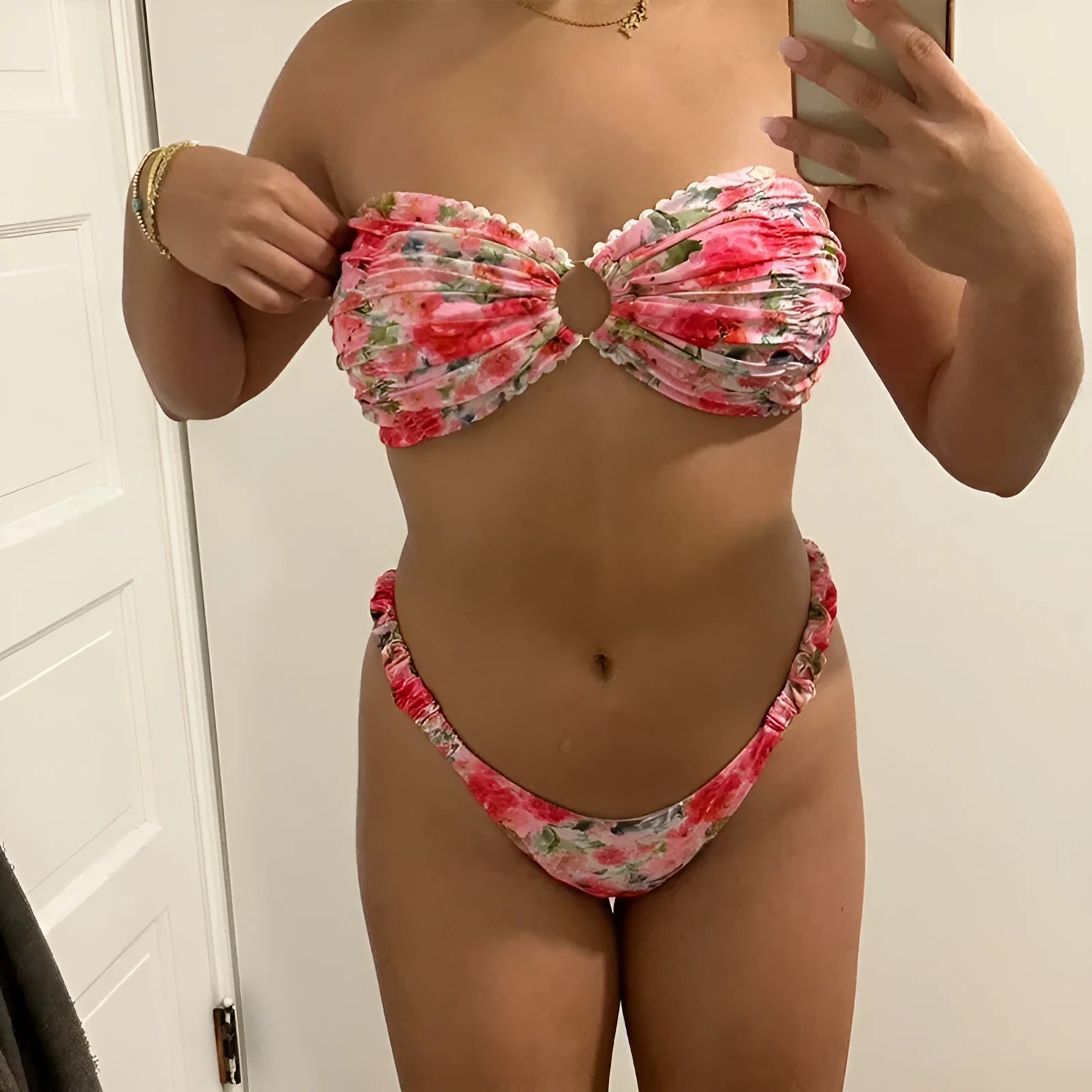 Floral print lace trim bikini top in blue, with matching short, shown on a mannequin.