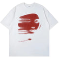 White cotton t-shirt with short sleeves and round neckline showing loose fit styling