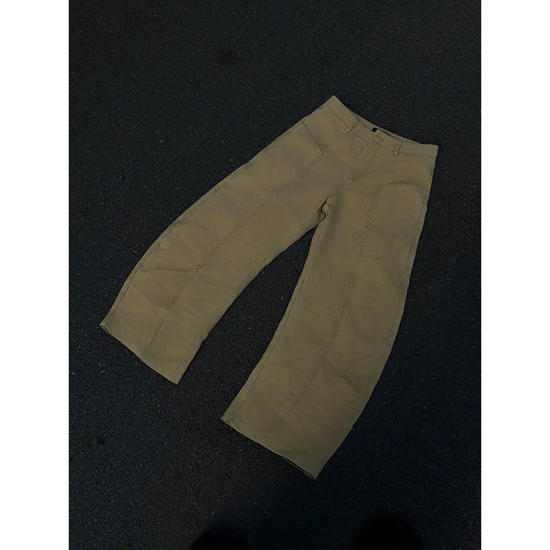American retro solid colour khaki straight pants for men on plain background