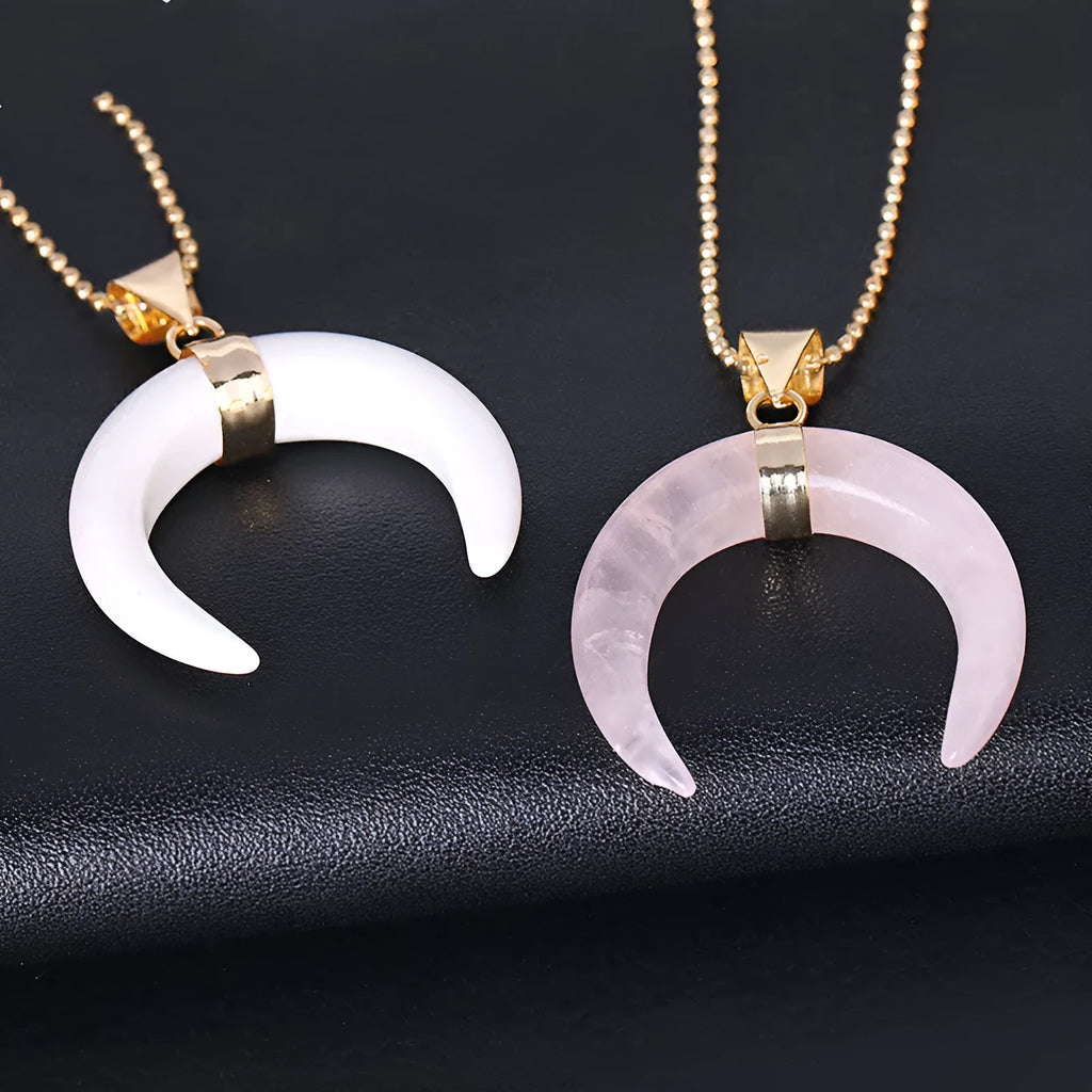 Close-up of a natural stone moon pendant necklace with electroplated copper chain.
