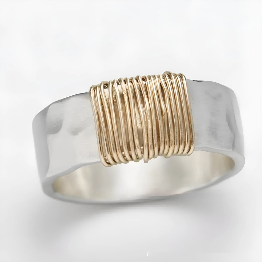 Copper geometric bracelet with irregular coil design in electroplated silver gold colour